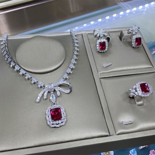 High-End Red Corundum Luxury Temperament Bow Full Diamond Open Ring Female Earrings Pendant Necklace Set