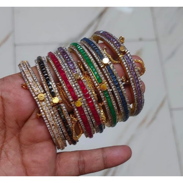 Elegant Gold-Plated Bangles Studded with Ruby Stones